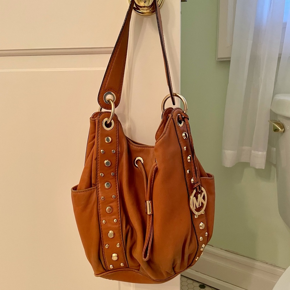 Brown leather Michael Kors bucket bag